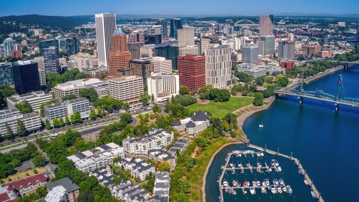 An aerial view shows downtown Portland and the Willamette River.