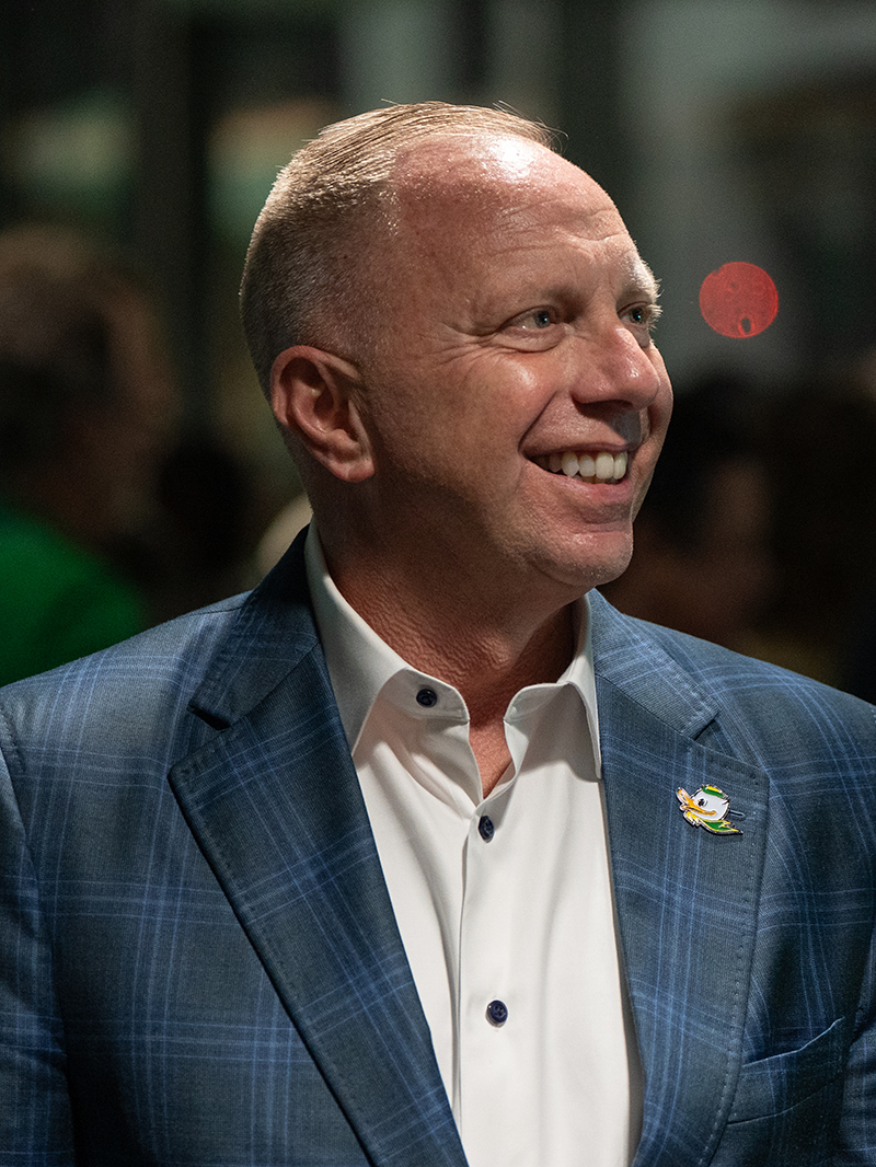 Rob Mullens smiles at an Oregon event.