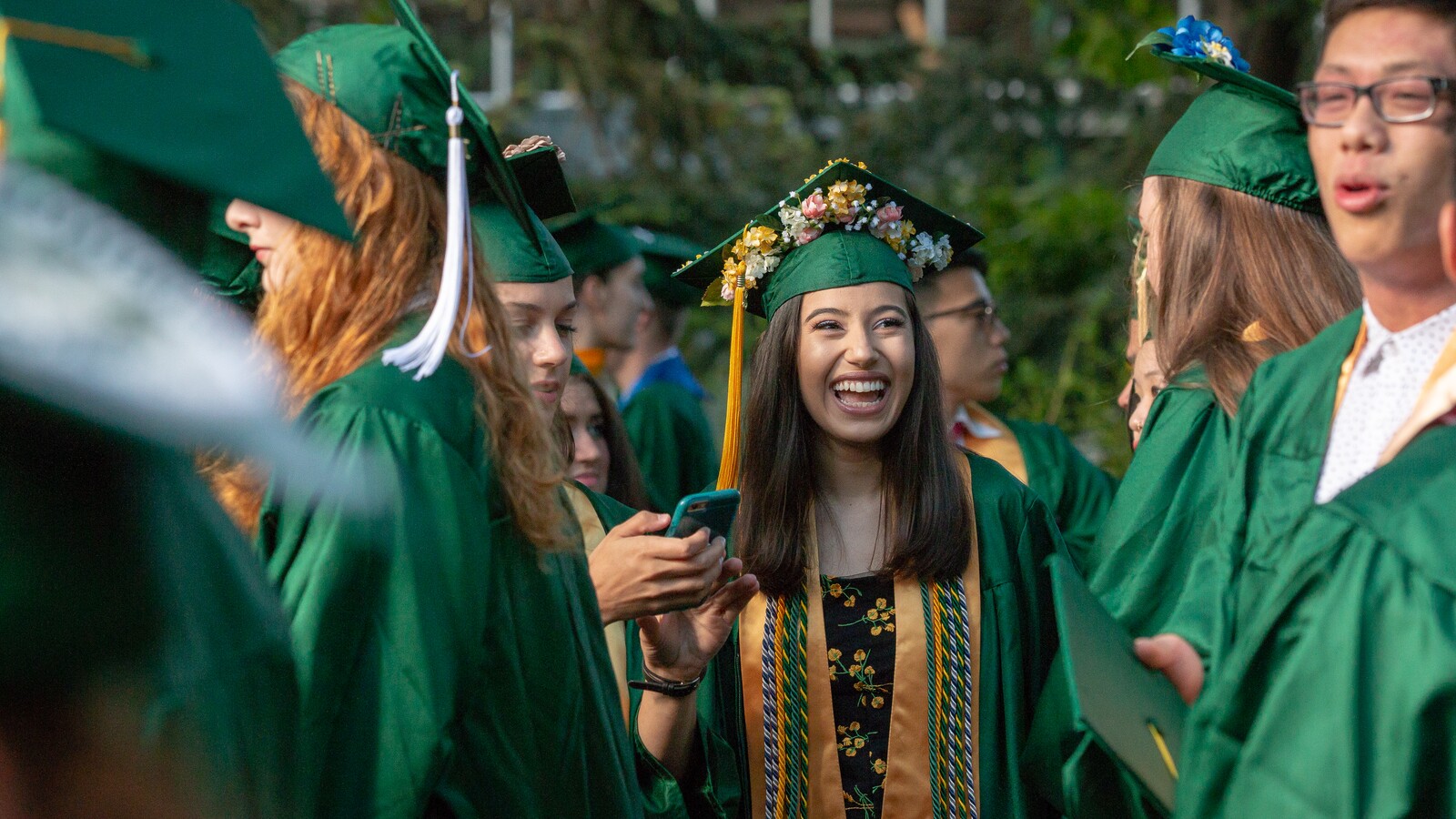 University of Oregon graduates celebrate at commencement.