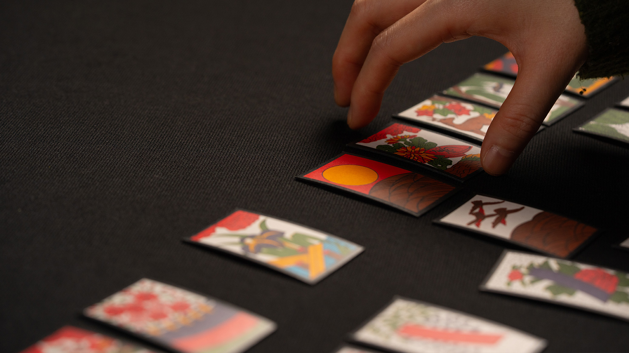 Student with Japanese karuta cards