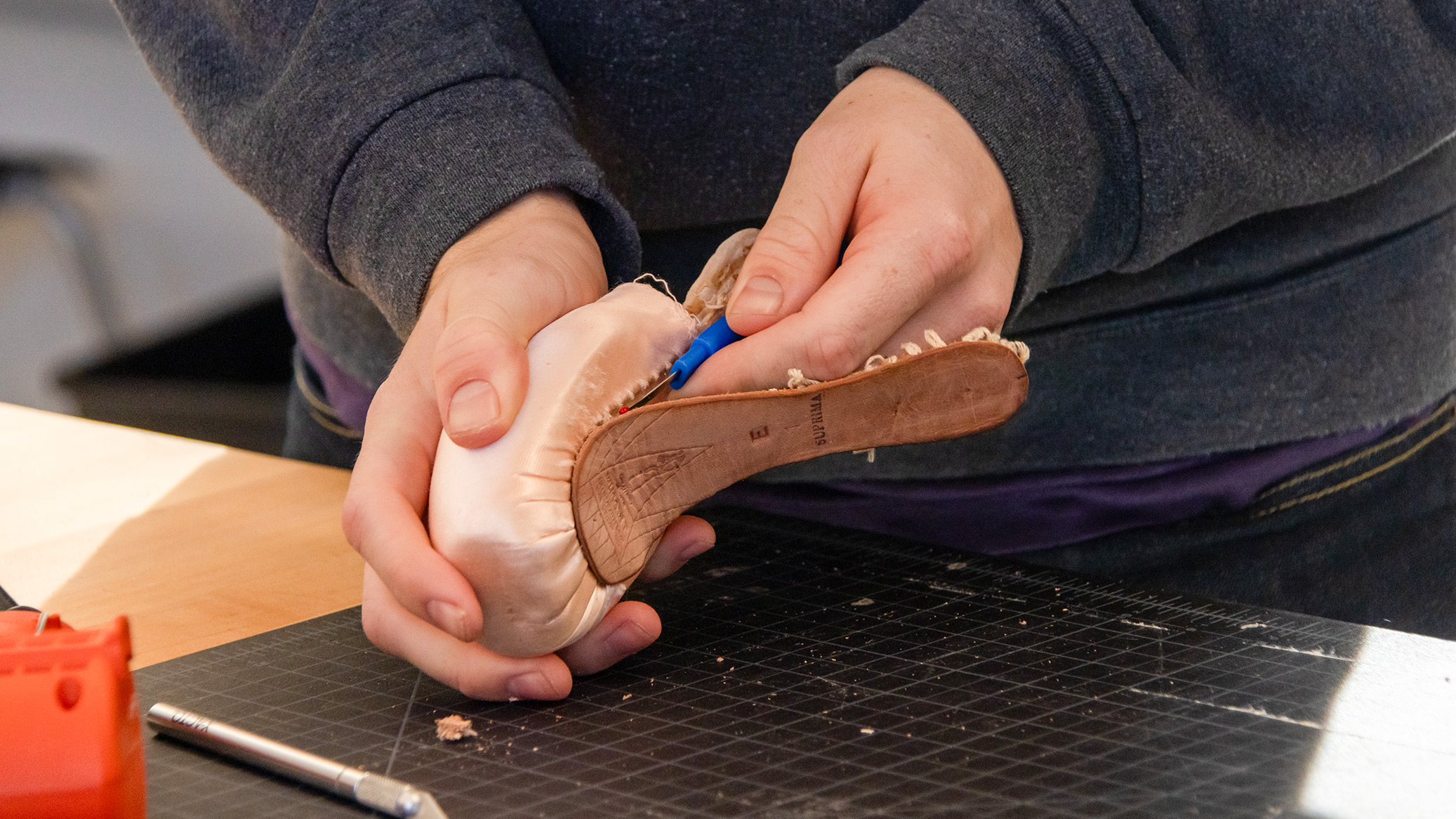 Student redesigning a pointe shoe