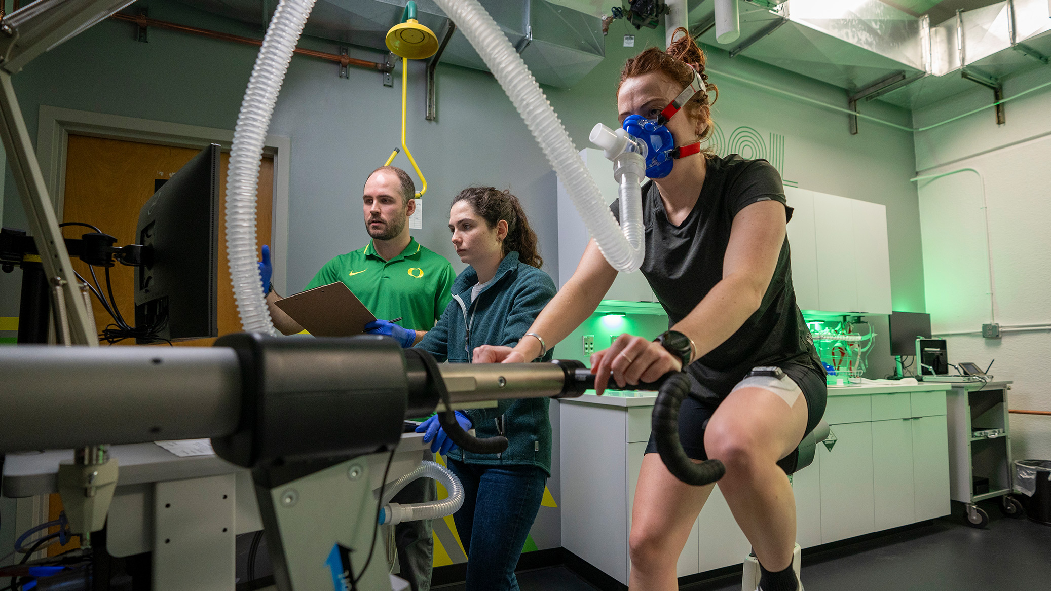 A cyclist wearing a breathing mask during a lab performance test