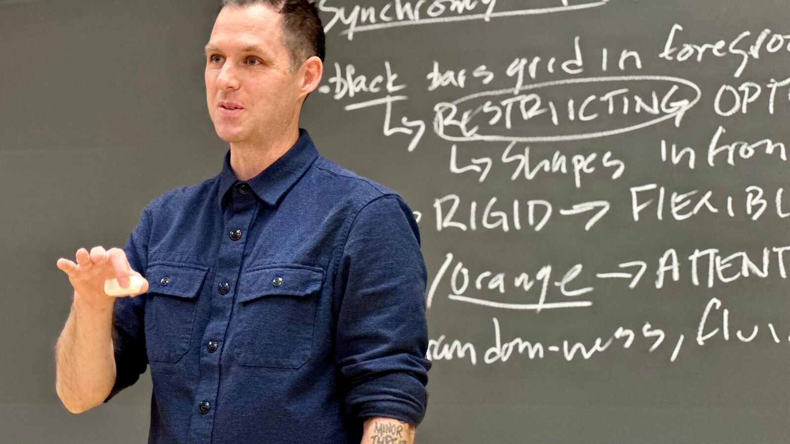 An instructor speaks during a cinema studies class.