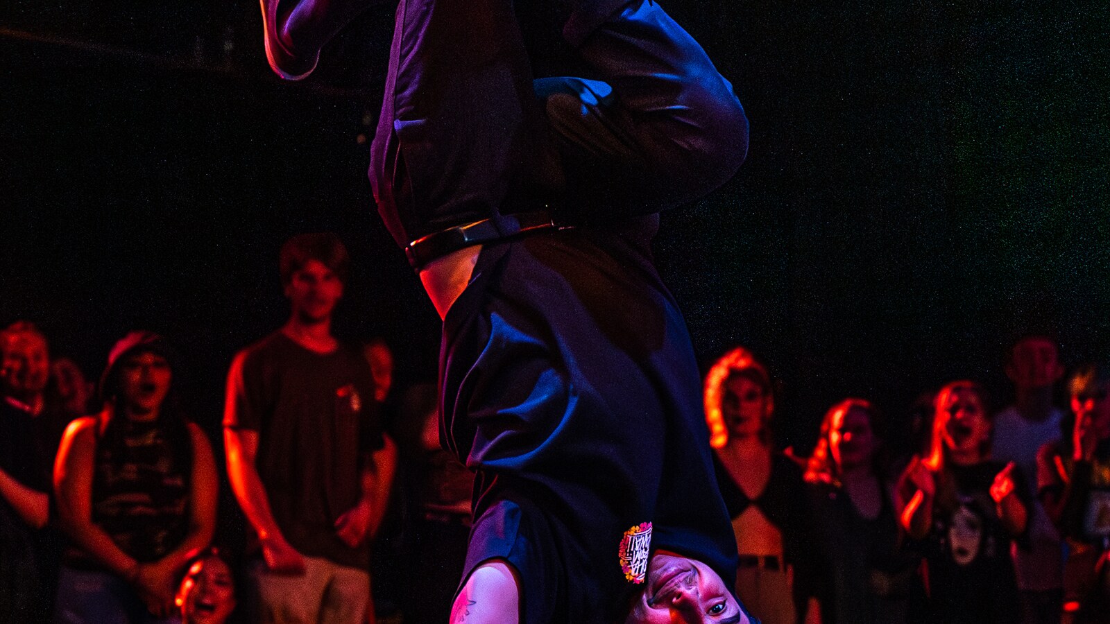 Students dance together at a hip hop event.