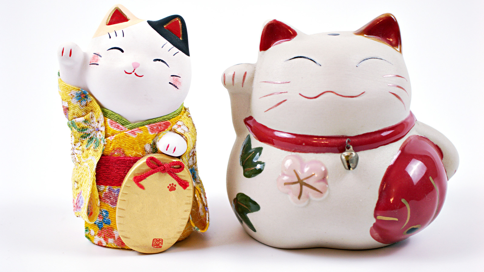 Lucky japanese cat souvenir ,maneki neko happy cat isolated on white background