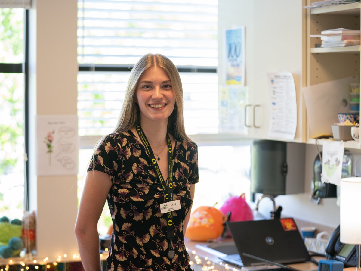 Anne Libby smiles in a children’s clinic.