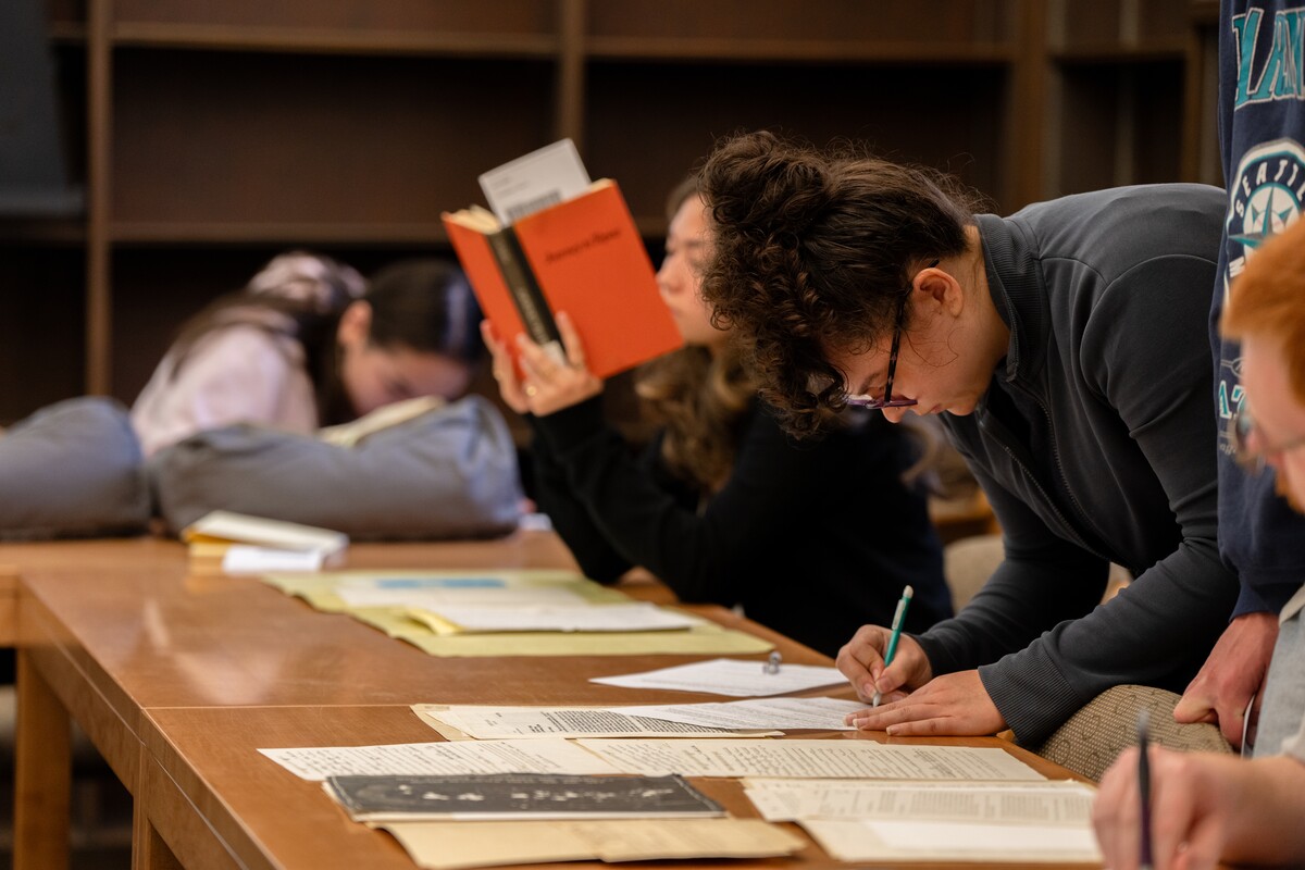 A student studies archival documents in the Browsing Room.