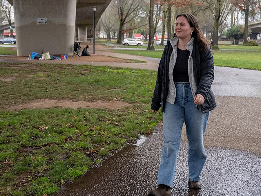 Almost every Saturday, Bella Albiani, a senior in the Clark Honors College, meets with members of her research group, the Homeless Policy and Health Project, at Eugene's Washington Jefferson Park to connect with the unsheltered. Last year, the group invited individuals at the park to participate in research, but now their visits are to hand out basic needs supplies. Albiani is one of the most consistent attendees.