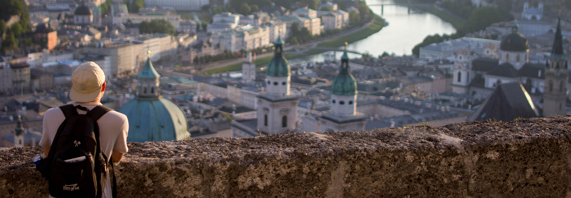 UO student looking out at buildings in Austria