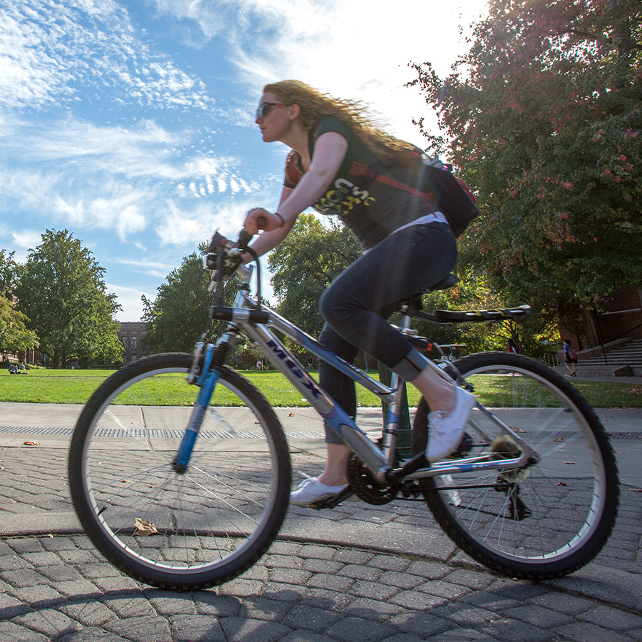 young woman riding bike