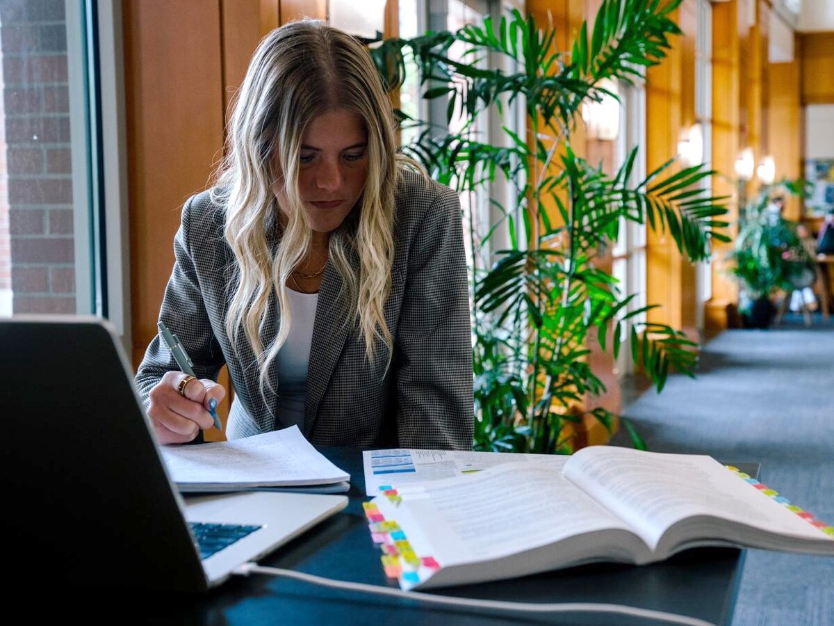 A student studies inside the law school.