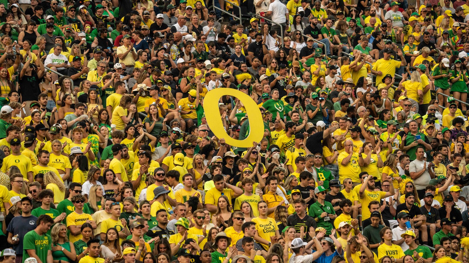 Oregon fans cheer during a football game at Autzen Stadium.