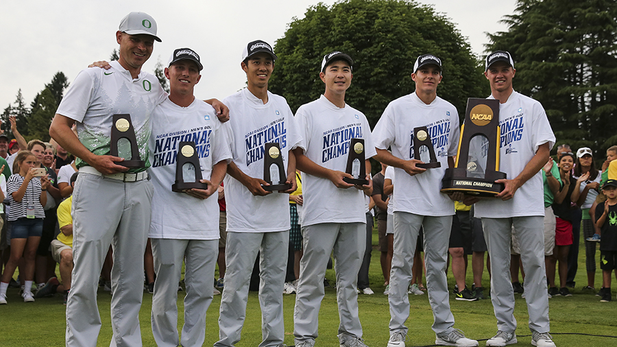 Members of the 2016 men's golf team pose with trophies