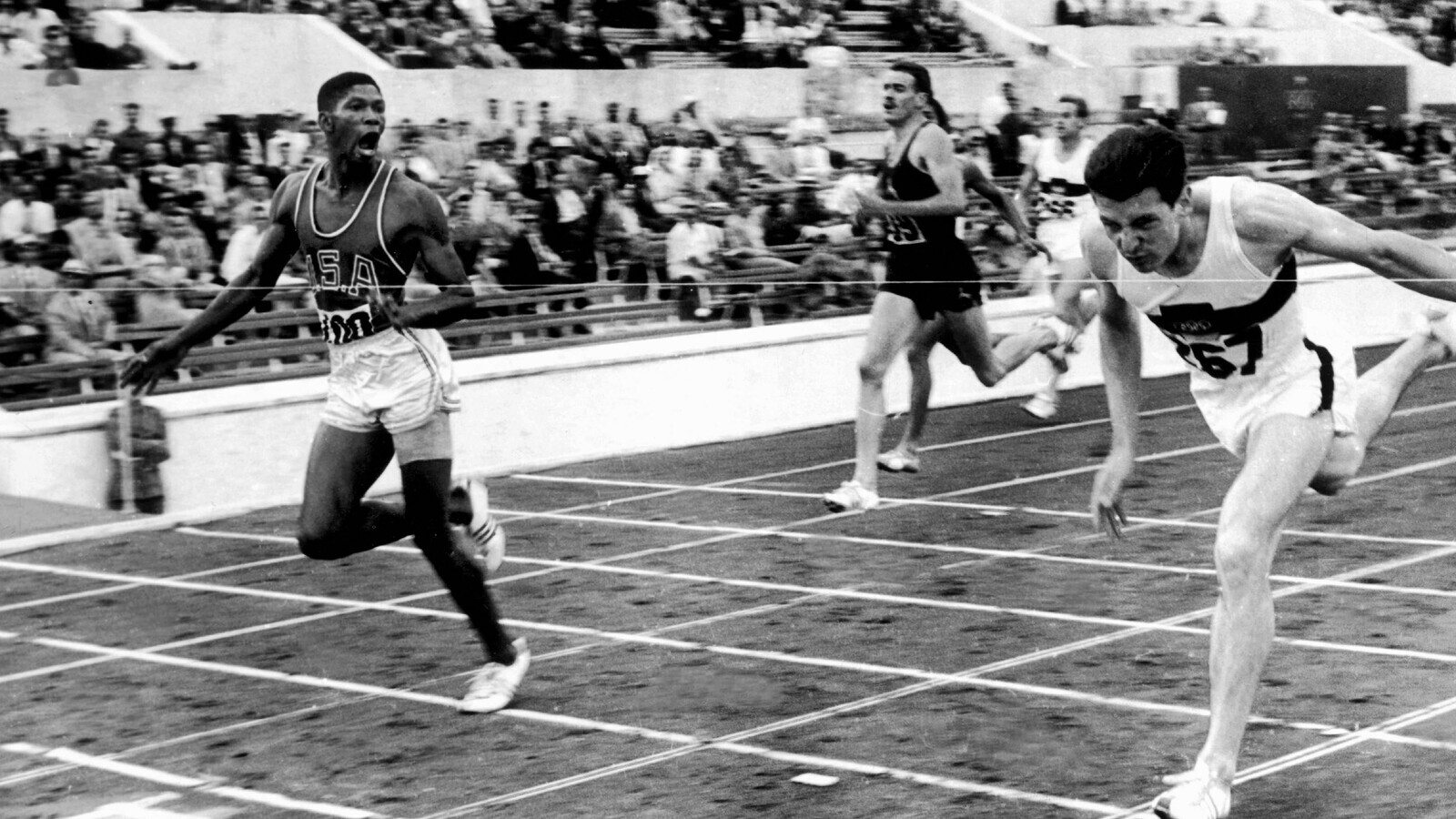 Otis Davis crosses the finish line in the 1960 Olympic 400-meter final.