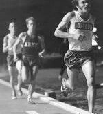 Steve Prefontaine runs on a track.
