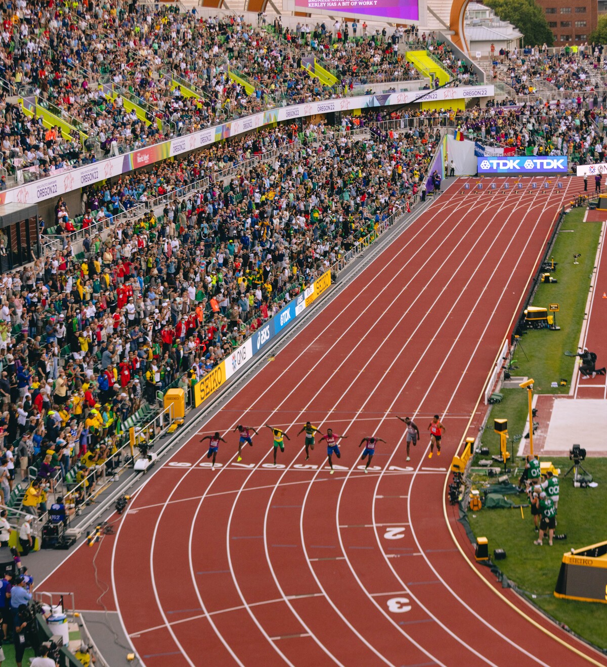 Runners compete before a packed crowd at Hayward Field.