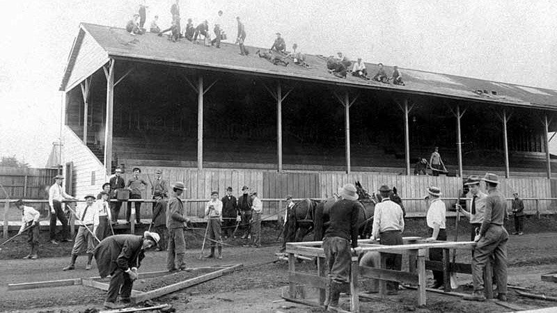 Historical photo of men working on the construction of Hayward Field