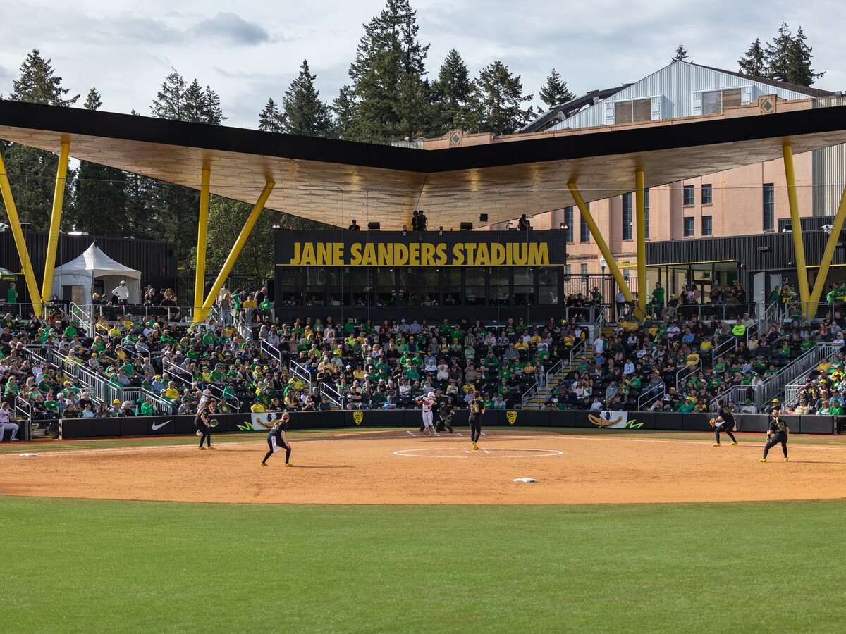 Fans watch a softball game at Jane Sanders Stadium.