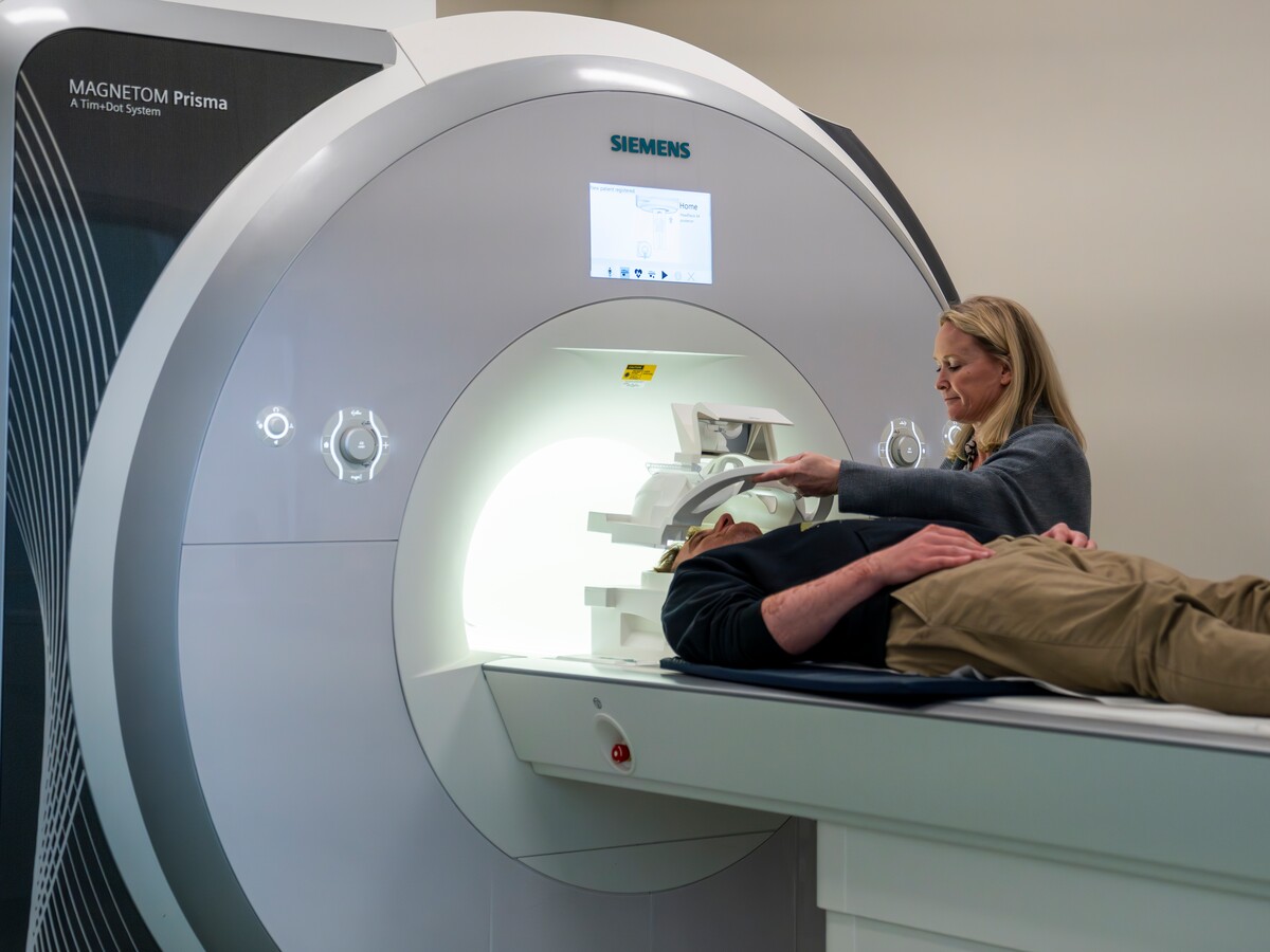 Researchers conduct a brain imaging study at the Lewis Center for Neuroimaging.