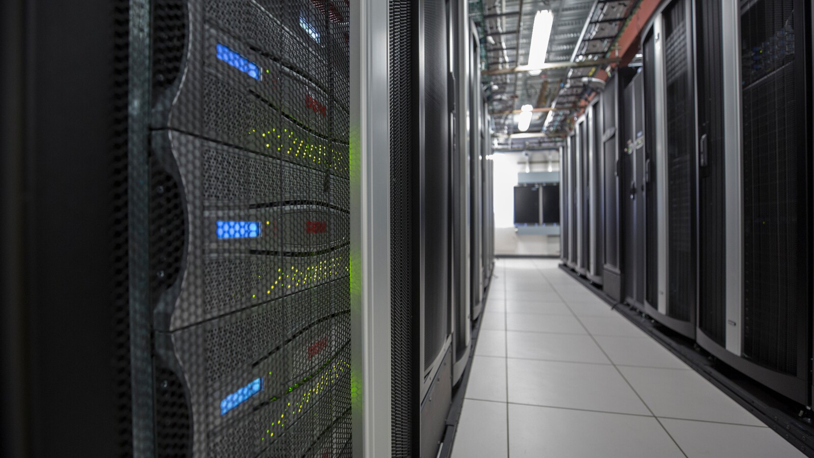 Server racks support University of Oregon research computing.