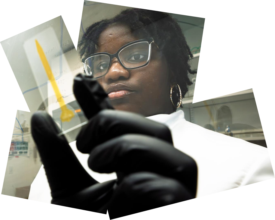 A researcher examines a sample in a laboratory.