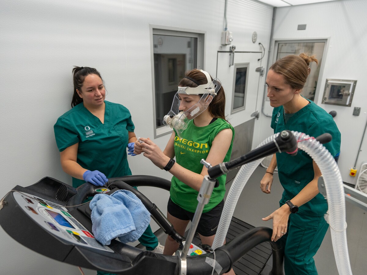 Researchers measure athletic performance in a human physiology laboratory.
