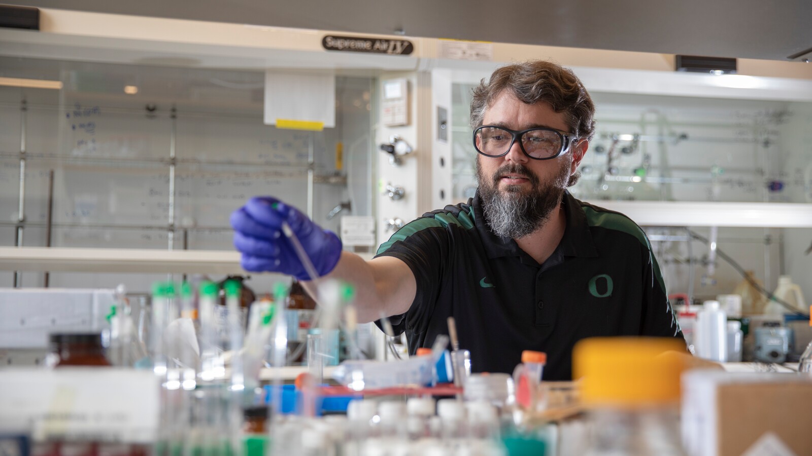 Darren Johnson works with laboratory materials.