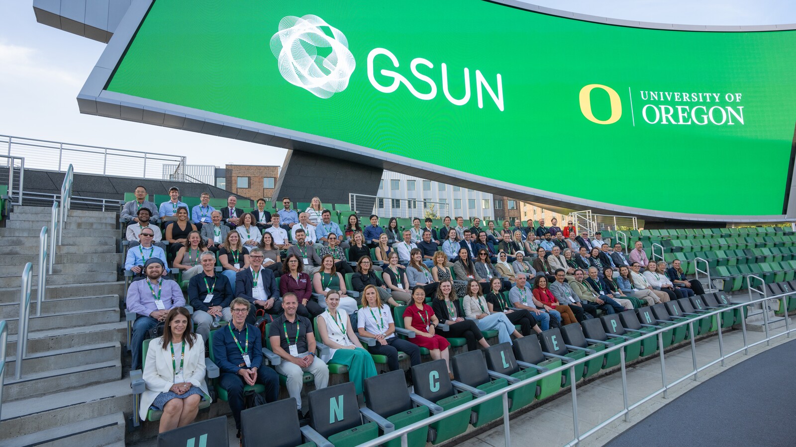Global Sports University Network participants pose at Hayward Field.