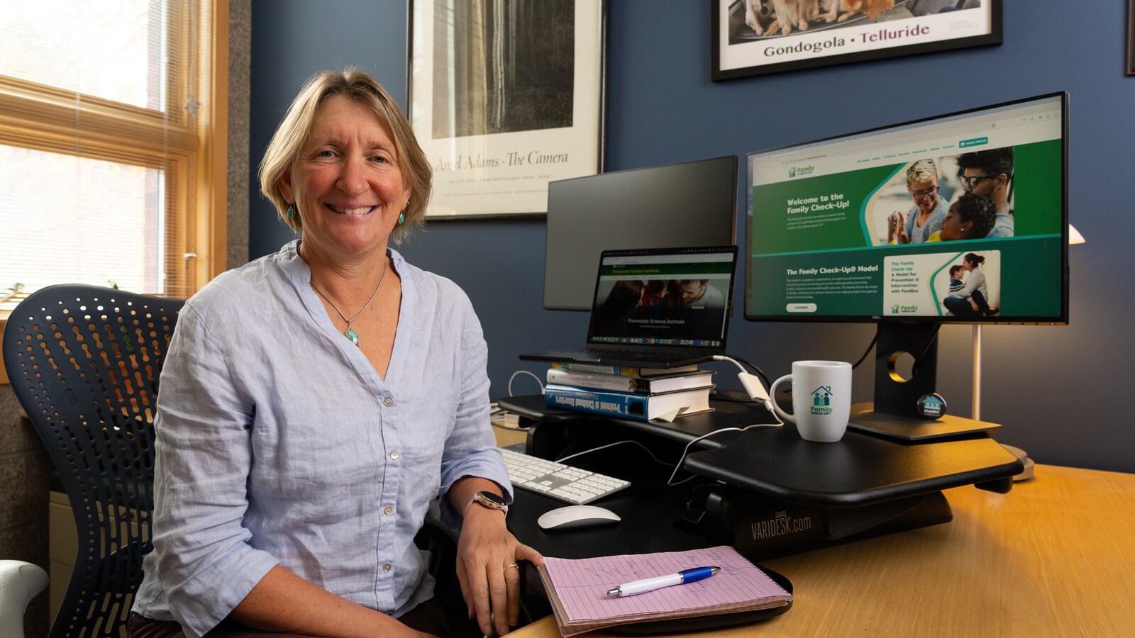 A researcher demonstrates the Family Check-Up mobile app.
