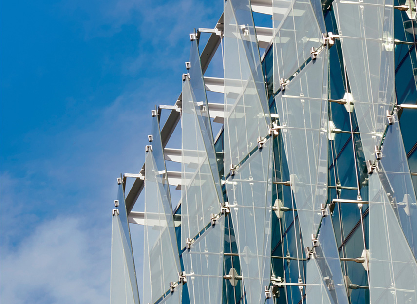 Exterior of the a Knight Campus building with a striking architectural glass exterior.