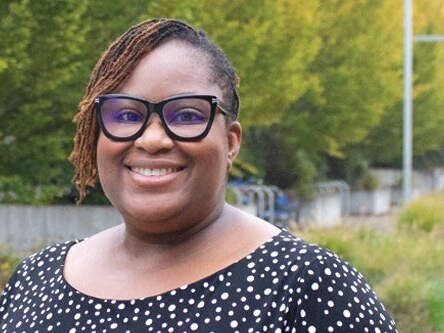 Kemi Balogun smiles for a portrait.