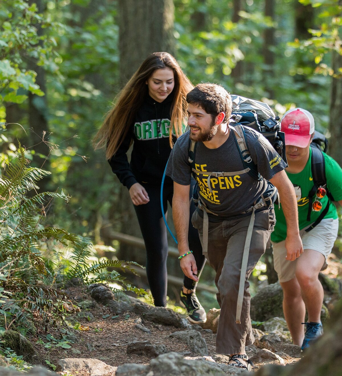 Students hike through a forest near Eugene.